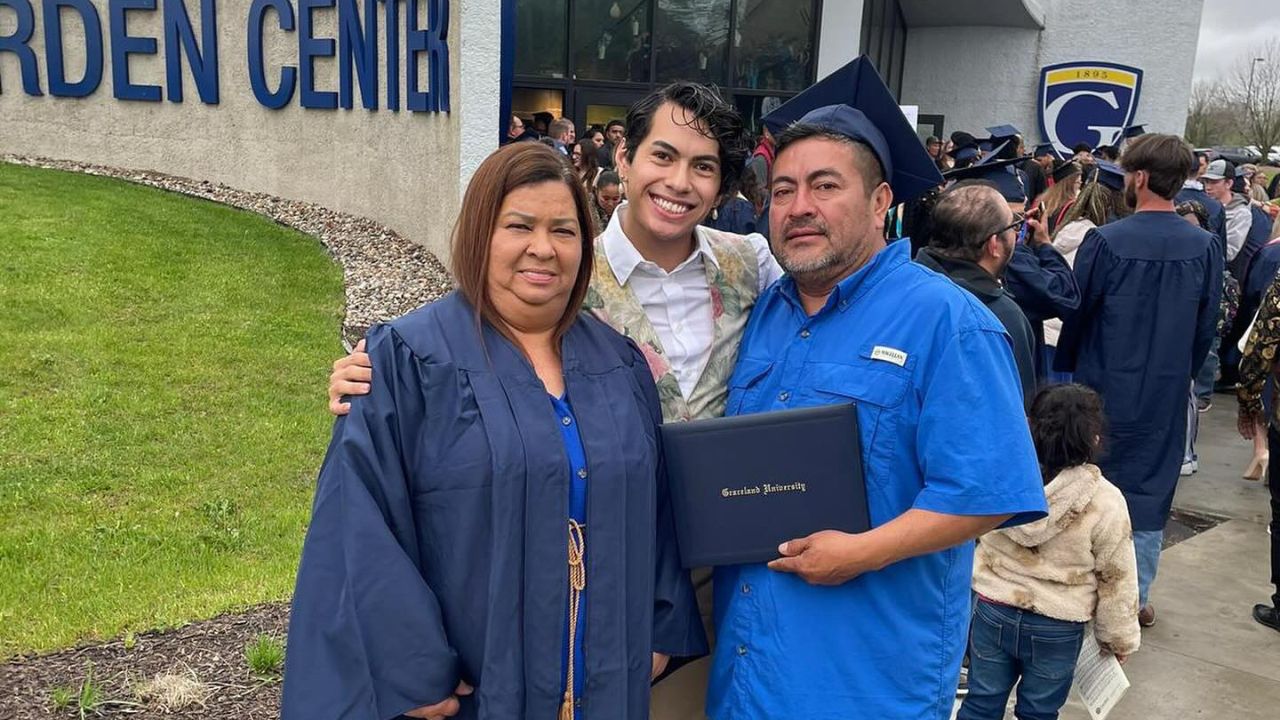 First-Generation College Grad Proudly Presents Parents With Cap And Gown
