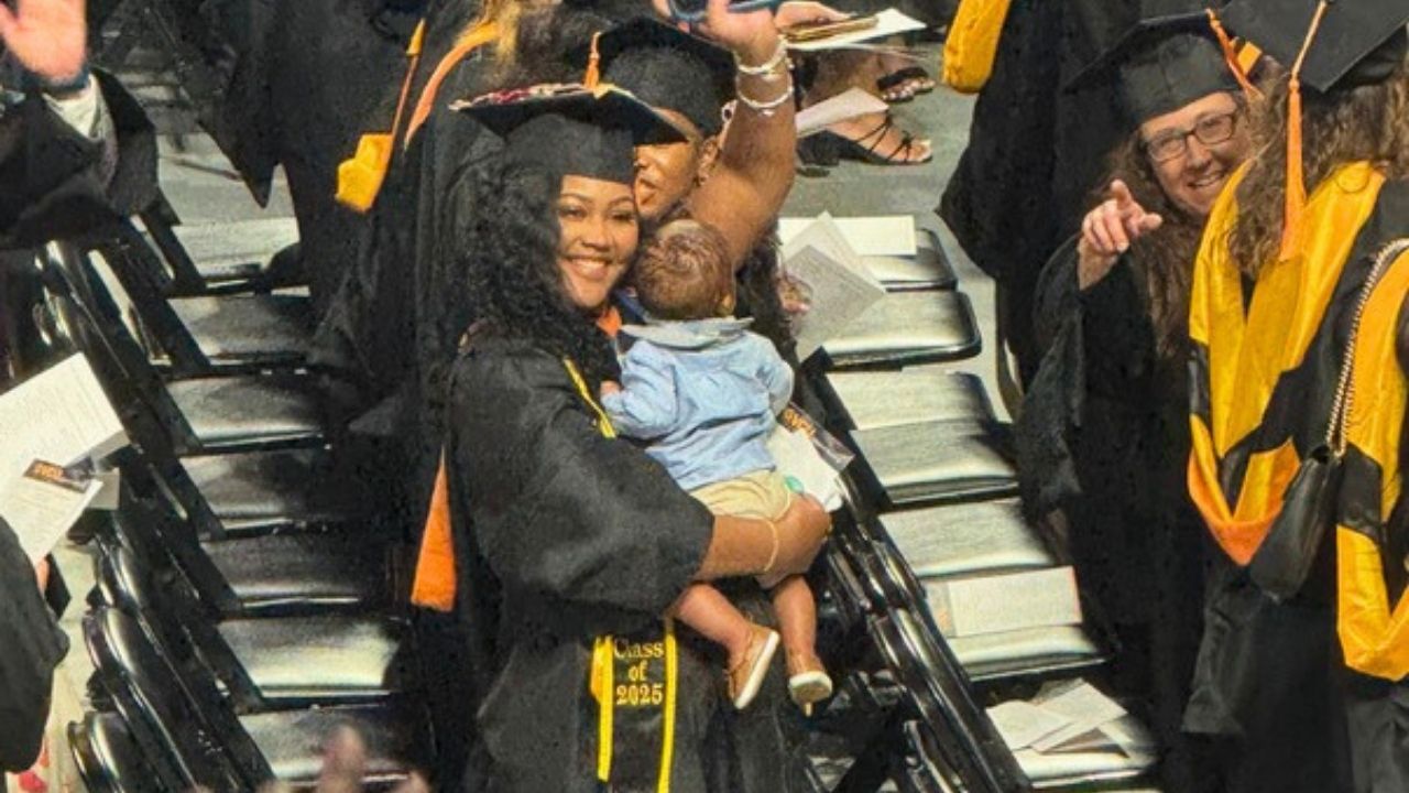 Mom Who Gave Birth During Nursing School Carries Baby Across Graduation Stage
